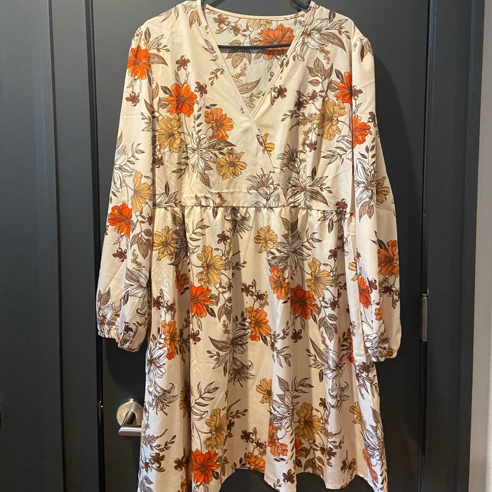 Plus sized cream, orange, and brown dress, perfect for fall!